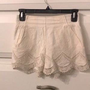 Cream colored lace shorts